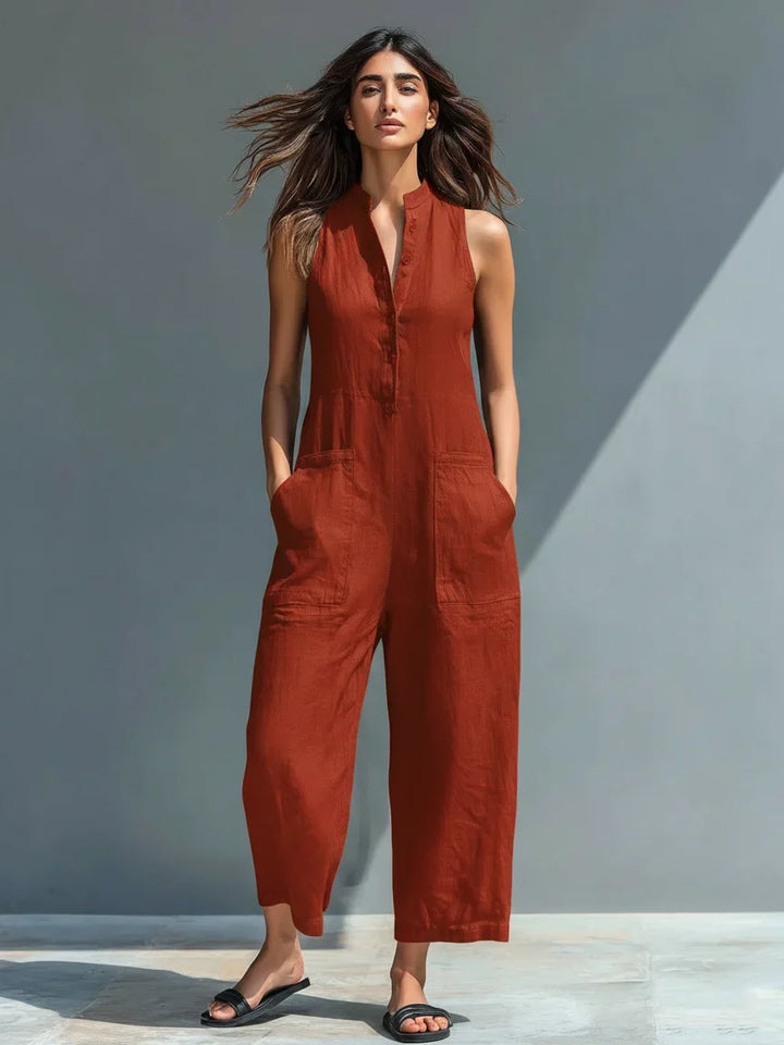 Elegant sleeveless wide leg women's jumpsuit, button front detail, perfect for comfortable summer fashion.