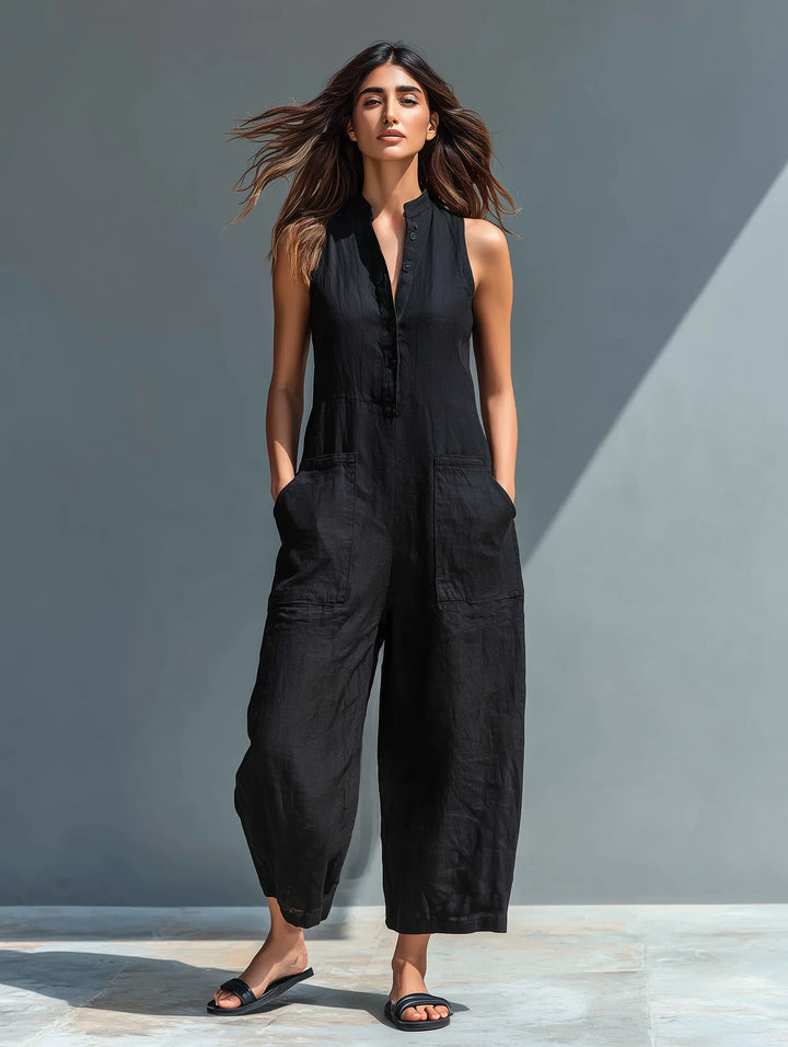 Women's sleeveless, wide leg, button-front jumpsuit. A versatile piece for casual or elegant summer wear.