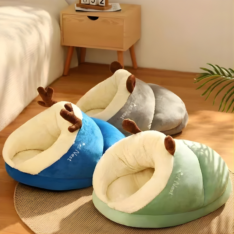 SnugBug green pet cave bed offering a cozy, calming hideaway for dogs and cats.