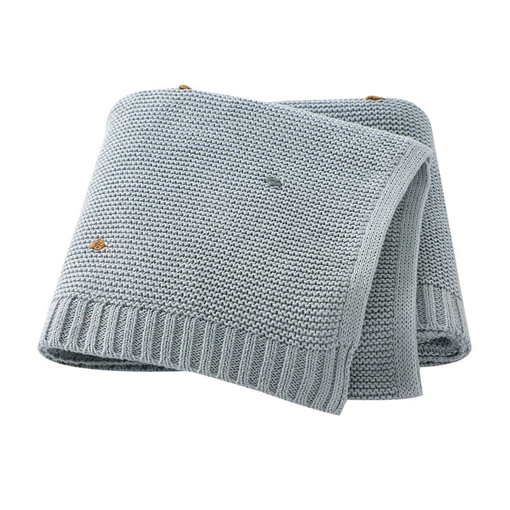 Breathable cotton knit baby blanket, ideal for newborns and all seasons.