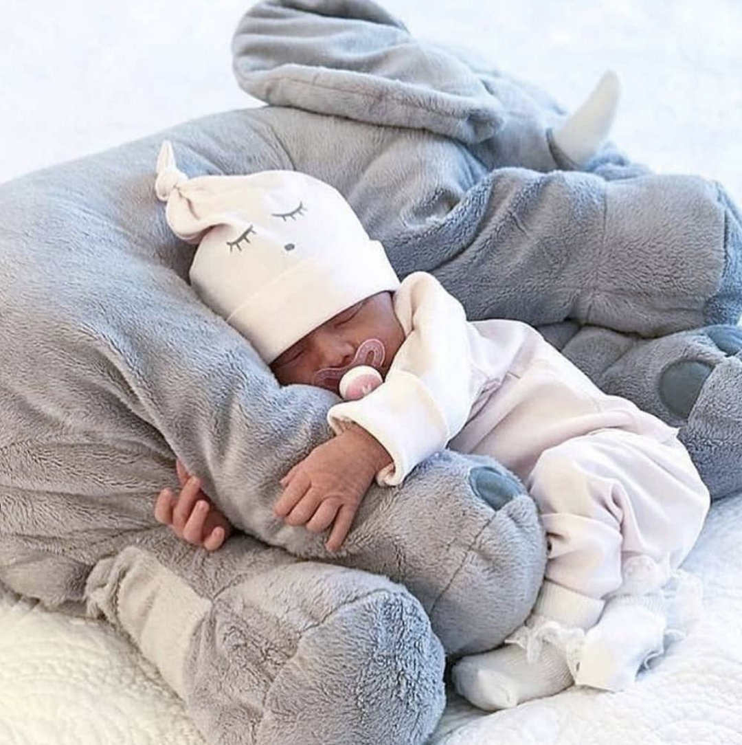 Soft elephant baby pillow for cozy cuddles and nursery decor.