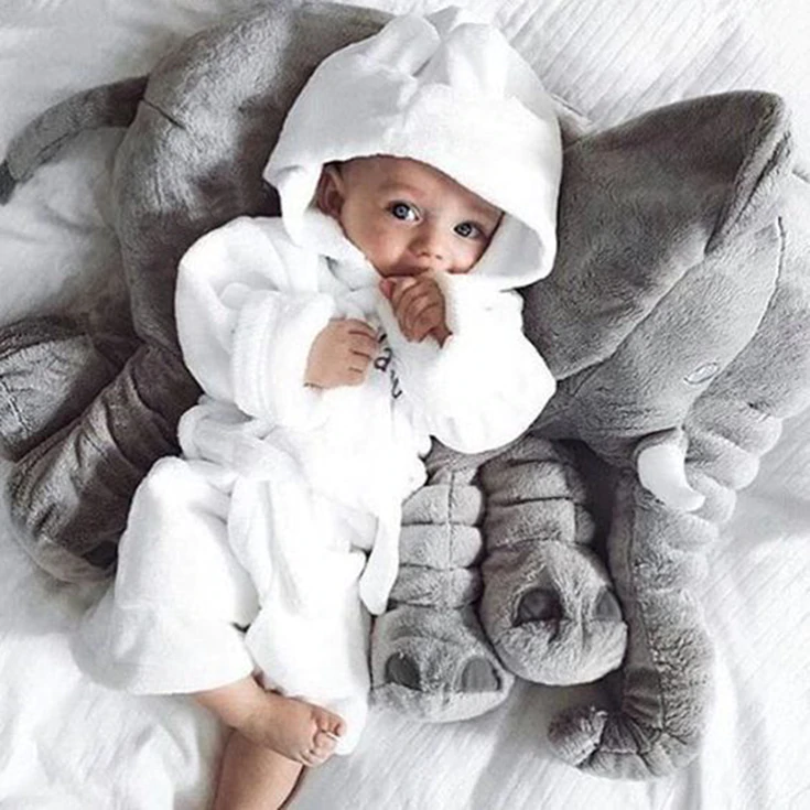 Soft and huggable elephant toy pillow for peaceful naps.