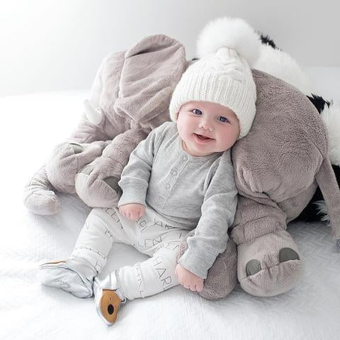 Comfortable elephant cuddle pillow, ideal as a nursery decor accessory.