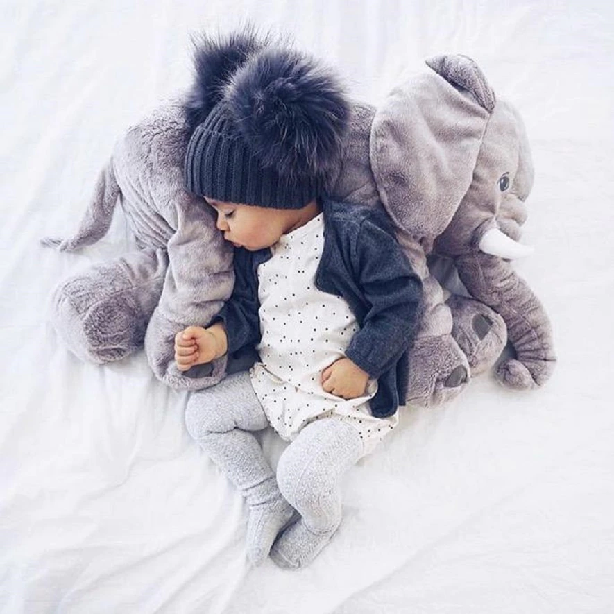 Perfect nursery decor: a soft elephant pillow for little ones.