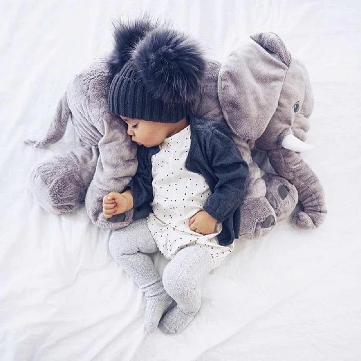 Perfect nursery decor: a soft elephant pillow for little ones.