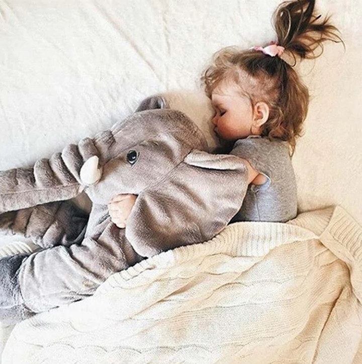 Charming elephant baby pillow, enhancing any nursery's aesthetic.