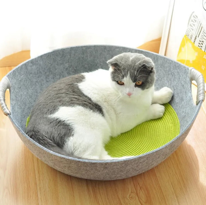 Soft felt cat bed basket with sturdy handles, ideal for pet comfort & modern home decor.