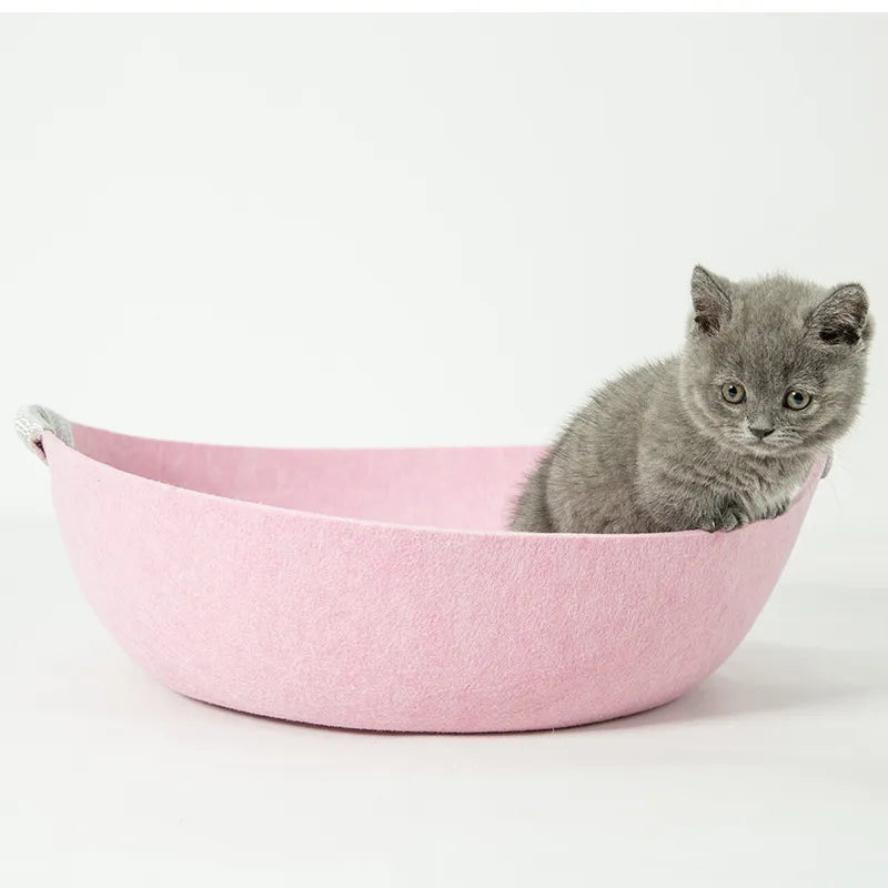 Stylish modern felt pet bed basket with handles, a comfortable cat hideaway & chic pet furniture.