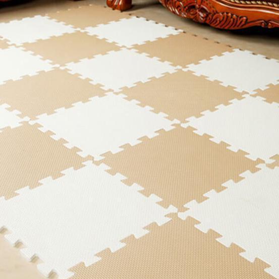 Kids' puzzle exercise mat, soft & interlocking foam tiles for cushioned play.