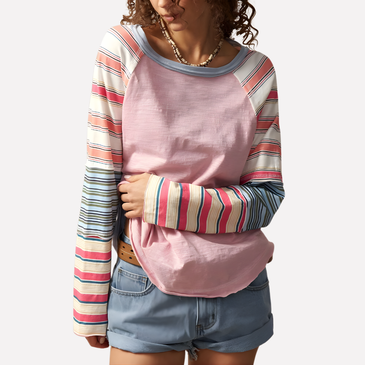 Versatile women's long sleeve raglan top with trendy striped sleeves. Ideal for comfortable casual & boho styles.