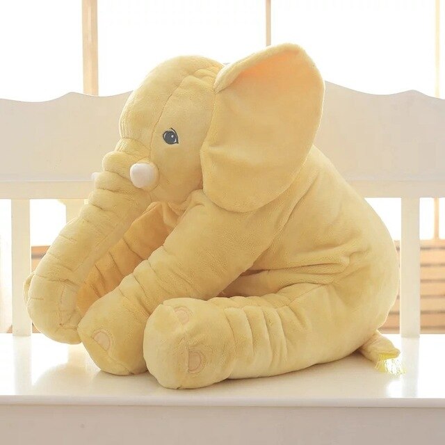 Cozy elephant nursery decor, a charming and soft plush pillow for kids' rooms.