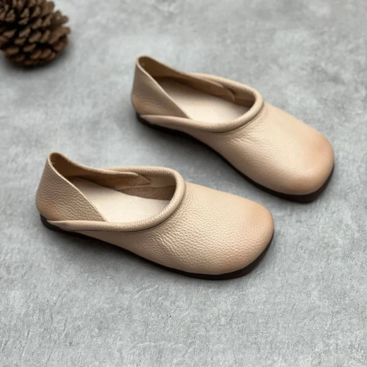 Stylish women's slip-on round-toe sandals, versatile for casual summer outfits & everyday comfort.
