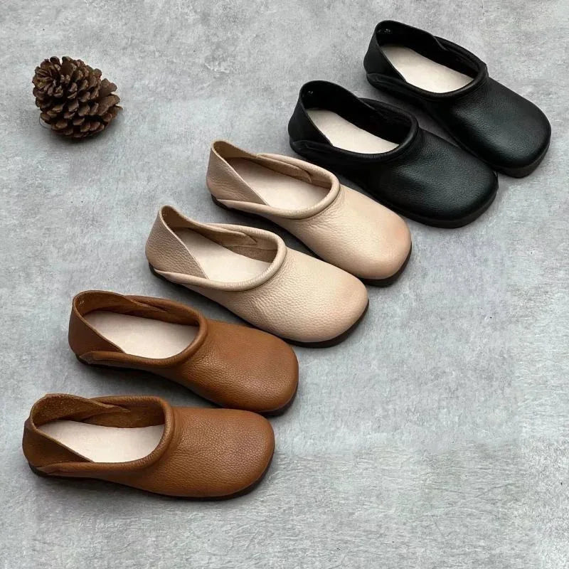 Close-up of comfortable women's slip-on round-toe sandals, perfect for casual summer walking & daily style.
