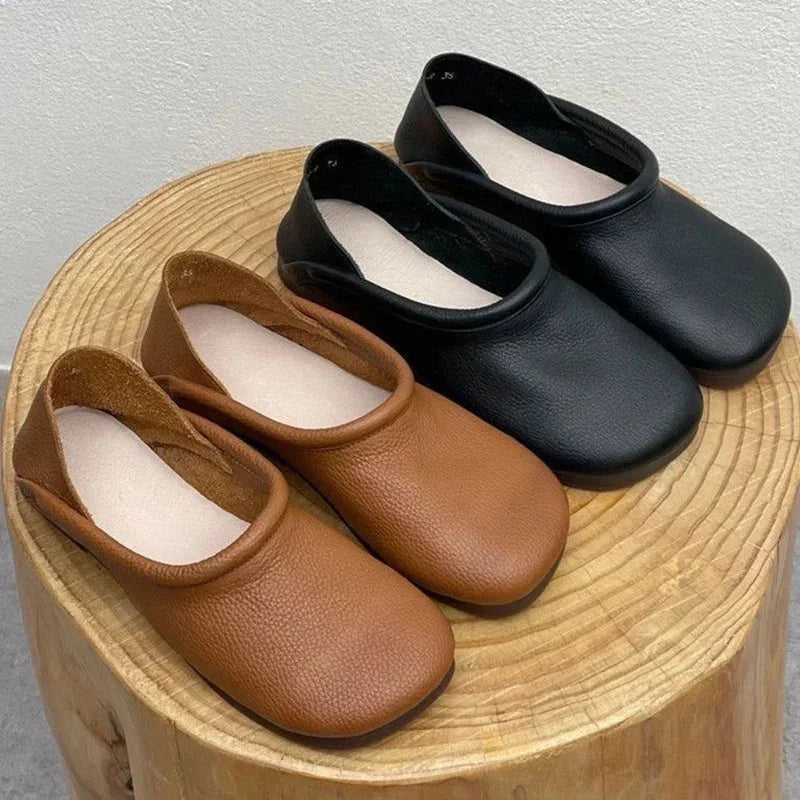 Soft & comfortable women's slip-on sandals featuring a round toe, perfect for relaxed summer days.