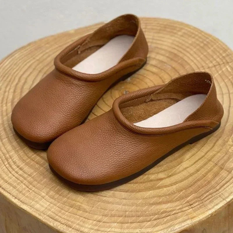 Modern women's soft slip-on round-toe sandals; comfortable, stylish summer footwear for versatile daily use.