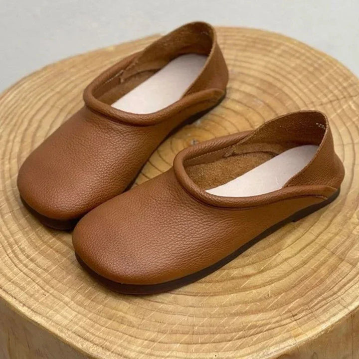Modern women's soft slip-on round-toe sandals; comfortable, stylish summer footwear for versatile daily use.