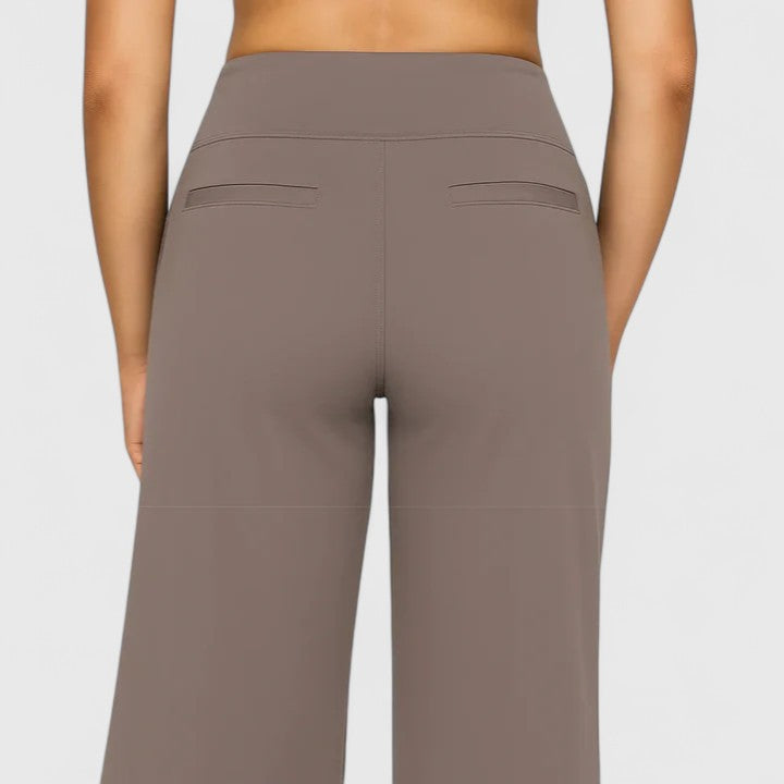 Soft stretch women's pull-on trousers. Sophisticated casual pants with pockets for ladies fashion.