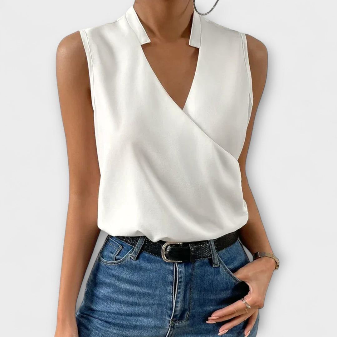 Sophisticated women's V-neck top for effortless style. Chic & versatile everyday fashion blouse.