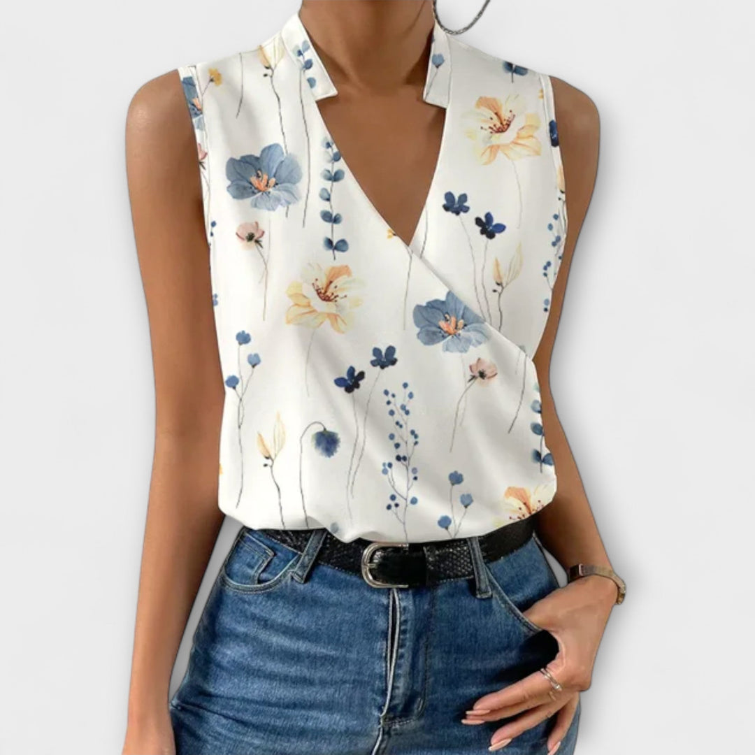 Chic women's V-neck top, designed for effortless style & comfort. A versatile blouse for any occasion.