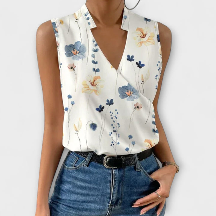 Chic women's V-neck top, designed for effortless style & comfort. A versatile blouse for any occasion.