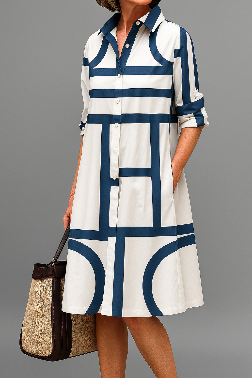 Sophisticated Women's white and blue patterned midi dress with a collar, elegant and versatile for work or occasions.
