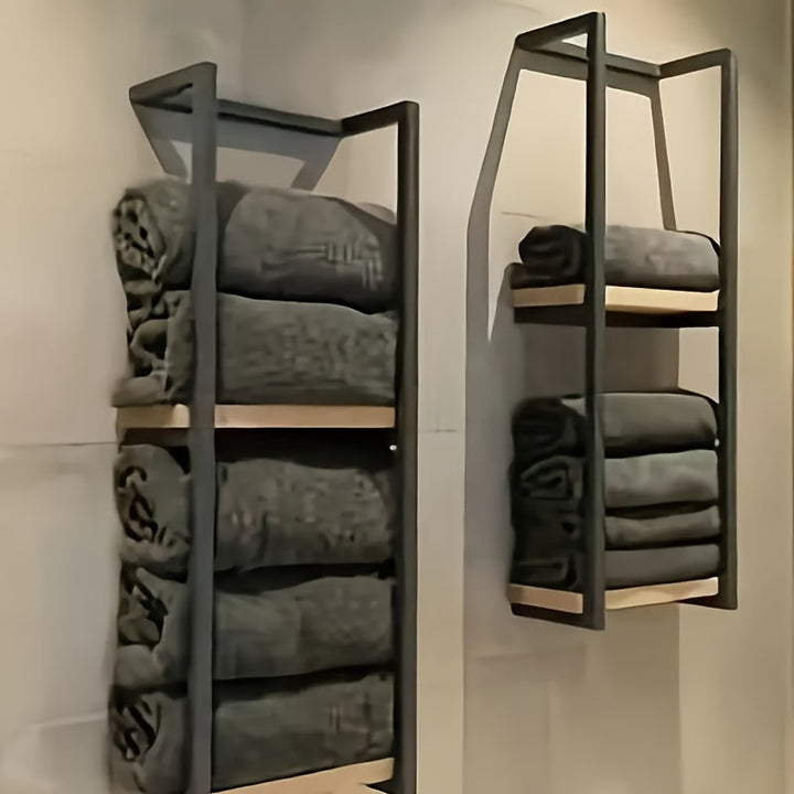 Elegant stainless steel towel rack, perfect for organizing towels and maximizing bathroom space.