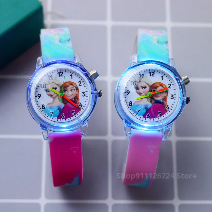 Close-up of a Spider-Man watch face, glowing in the dark for kids.