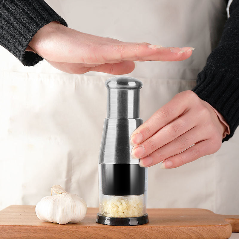 Stainless steel garlic press for easy mincing & crushing fresh garlic cloves, a key kitchen tool.
