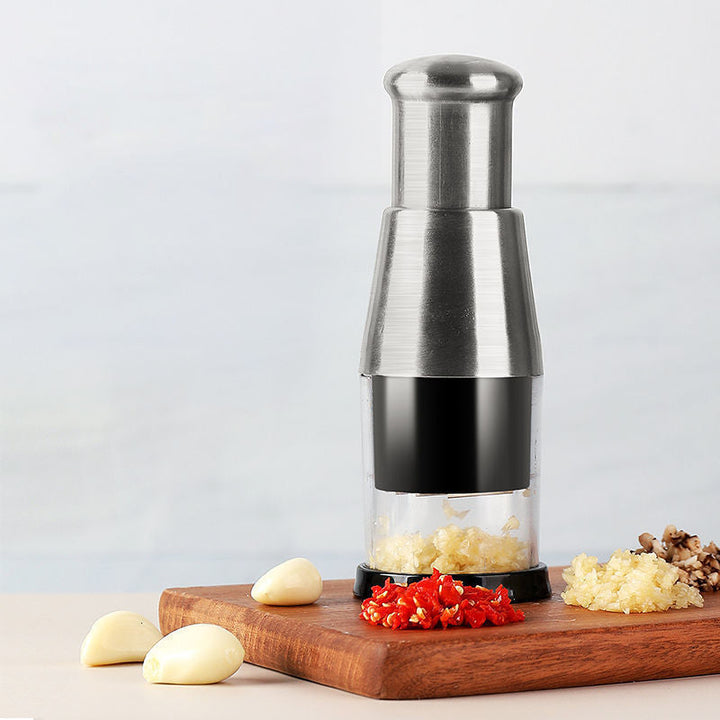 Ergonomic stainless steel garlic press, perfect kitchen gadget for quick meal prep & home cooking.