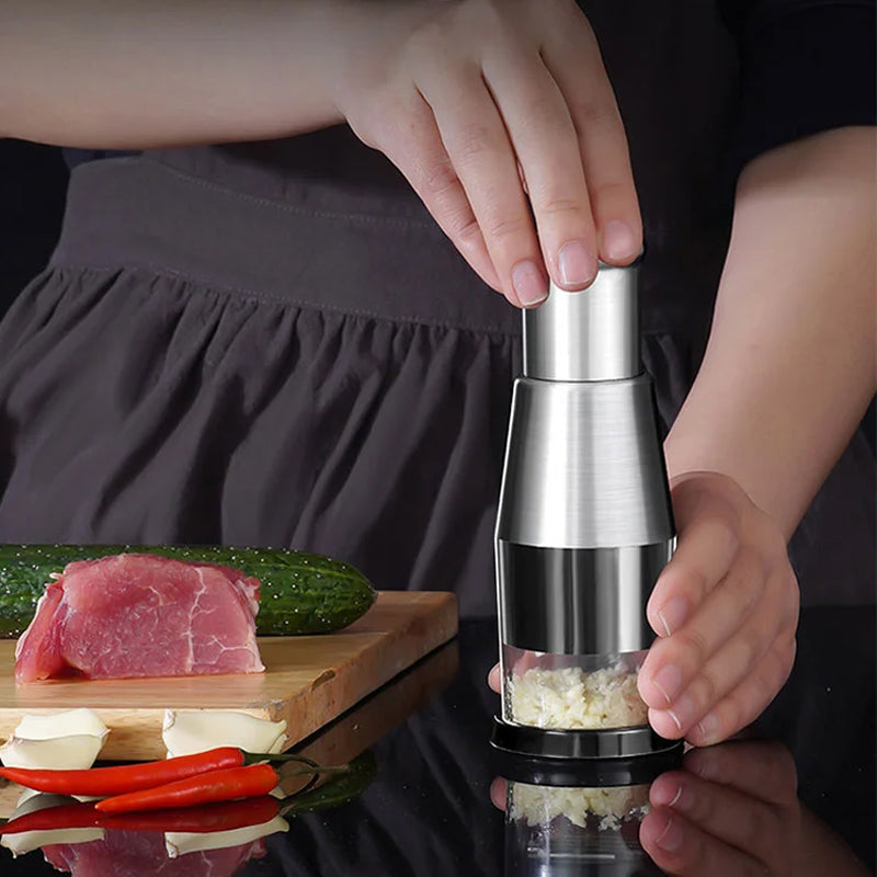 Durable stainless steel garlic press with easy-clean design, a must-have cooking utensil for chefs.