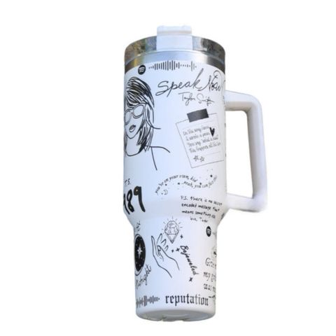 Stainless steel insulated tumbler with handle, perfect for keeping beverages hot or cold.