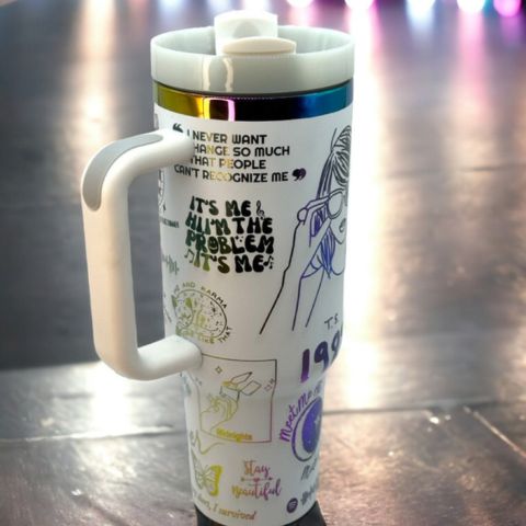 Portable stainless steel cup with handle, a great eco-friendly alternative to disposable cups.