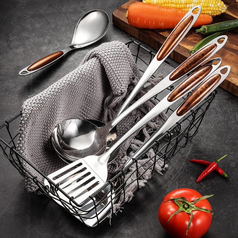 Elegant stainless steel kitchen tools with natural wooden handles. A complete set for stylish and efficient gourmet cooking.