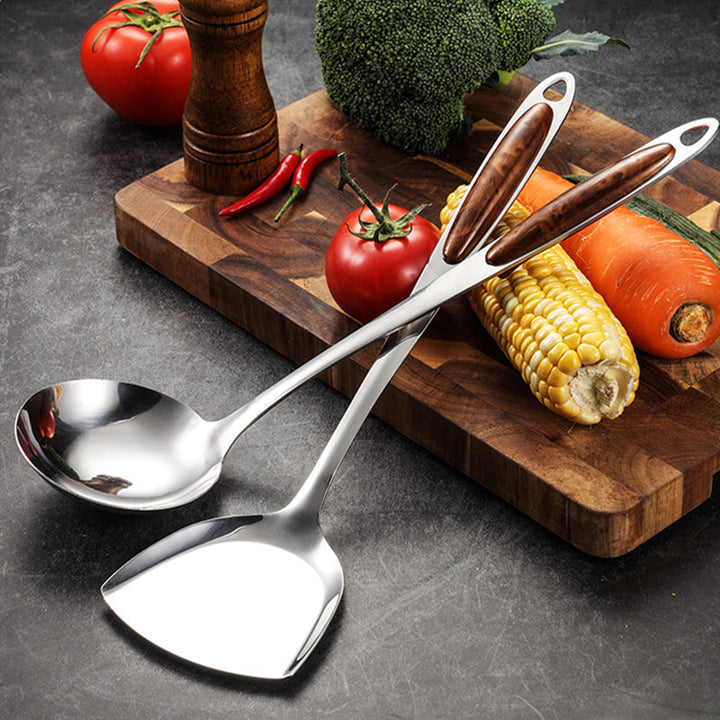 Complete stainless steel kitchen utensil set. Wooden handle cooking tools for every home chef. Durable & essential kitchenware.