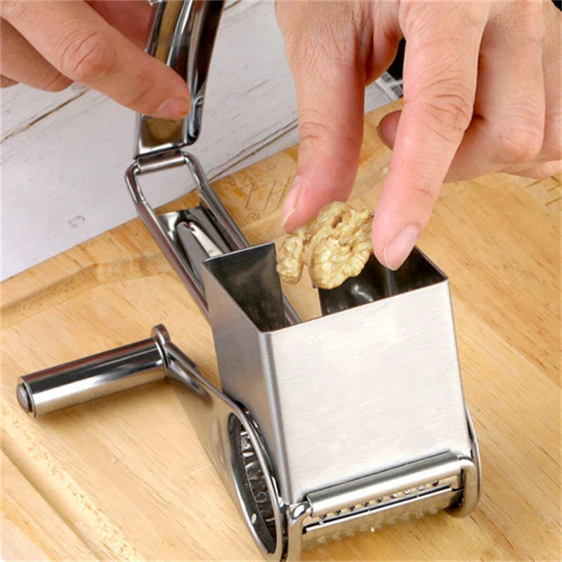 Versatile manual rotary grater for cheese, nuts, & chocolate. An easy clean kitchen tool.