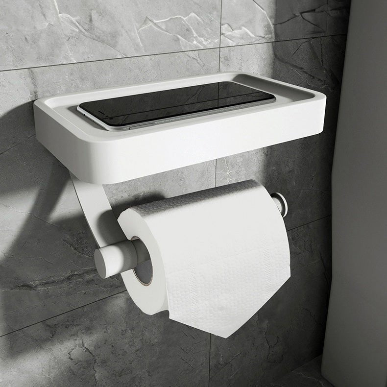 Easy-install stainless steel toilet paper holder and organizer shelf for a tidy bathroom.