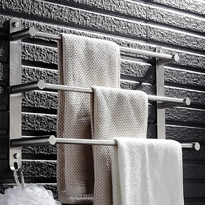 Modern bathroom towel rack. Wall mounted stainless steel design with 3 bars & 2 hooks for neat storage.