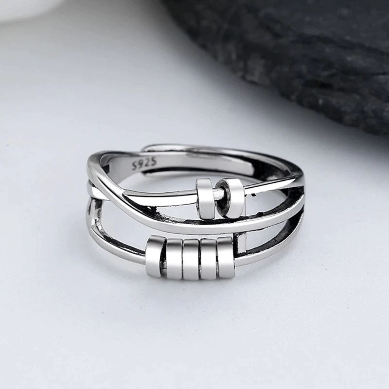 Sterling silver dual band spinner fidget ring for women, designed for stress relief and anxiety management. Calming jewelry, adjustable.