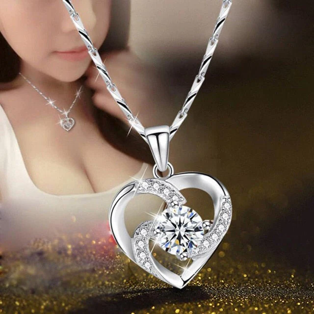 Sterling silver heart pendant necklace with sparkling cubic zirconia, a perfect Christmas gift.