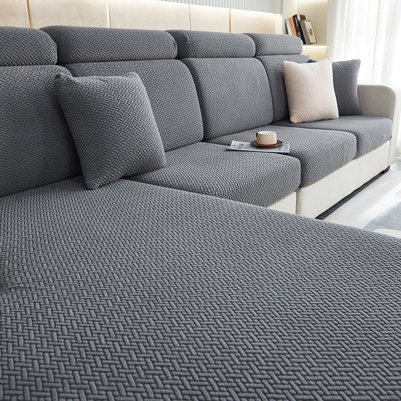 Modern stretchable sectional couch cover, transforming living room decor with vibrant colors.