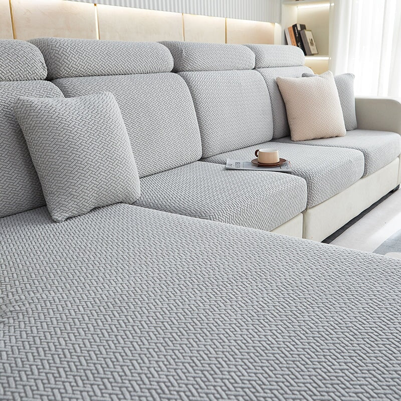 Universal fit stretchable sectional sofa cover, adapting to various sofa shapes & sizes.