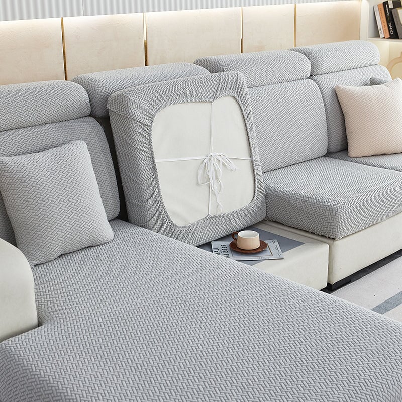 High-elasticity stretch sectional couch cover, offering a smooth feel & snug furniture protection.