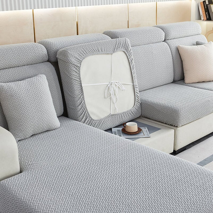 High-elasticity stretch sectional couch cover, offering a smooth feel & snug furniture protection.