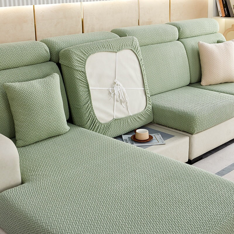 L-shape sectional sofa cover, highly stretchable & protective, ideal for modern homes.