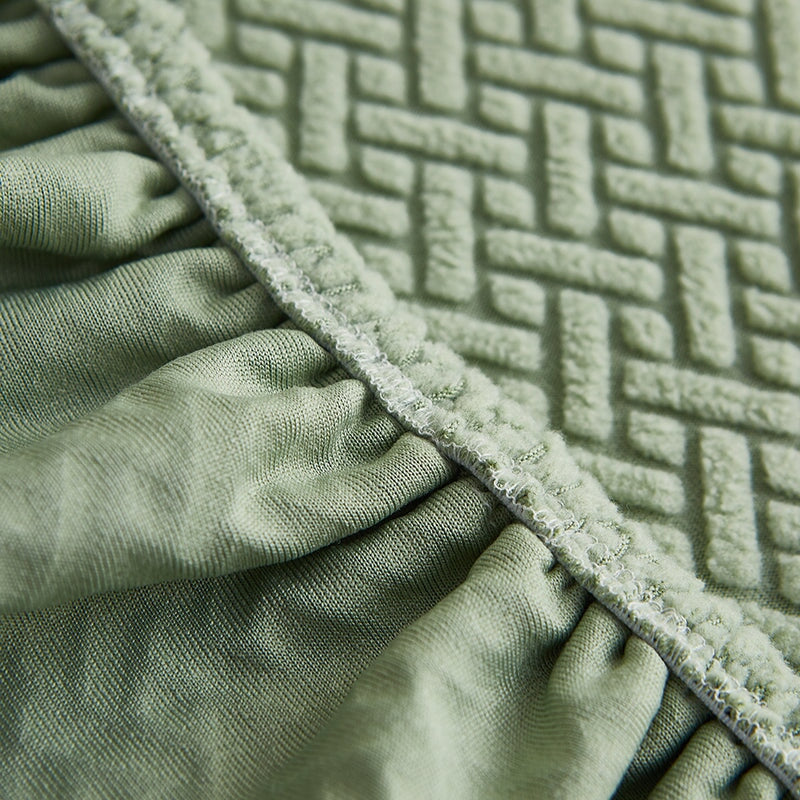 Soft, stretchable couch cover for sectional sofas, providing comfortable protection.