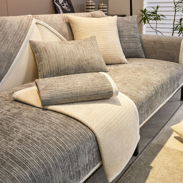 Full view of a sofa with a striped chenille anti-scratch, pet-friendly furniture protector.