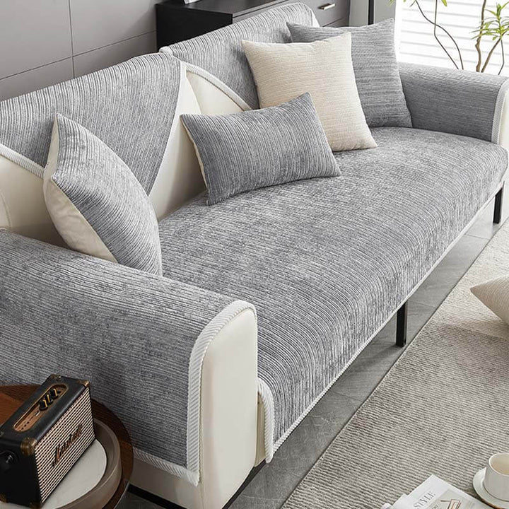 Robust striped chenille sofa protector, anti-scratch & pet-friendly, for durable furniture care.
