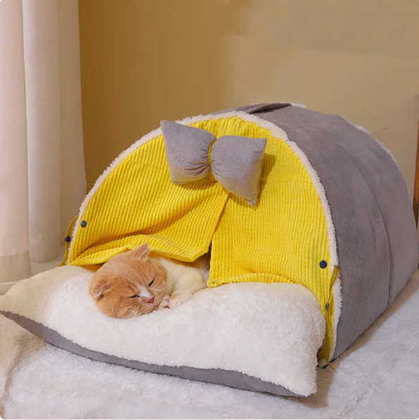 Pet cat house in arch design featuring a bow accent, providing a stylish and comfortable pet furniture piece.