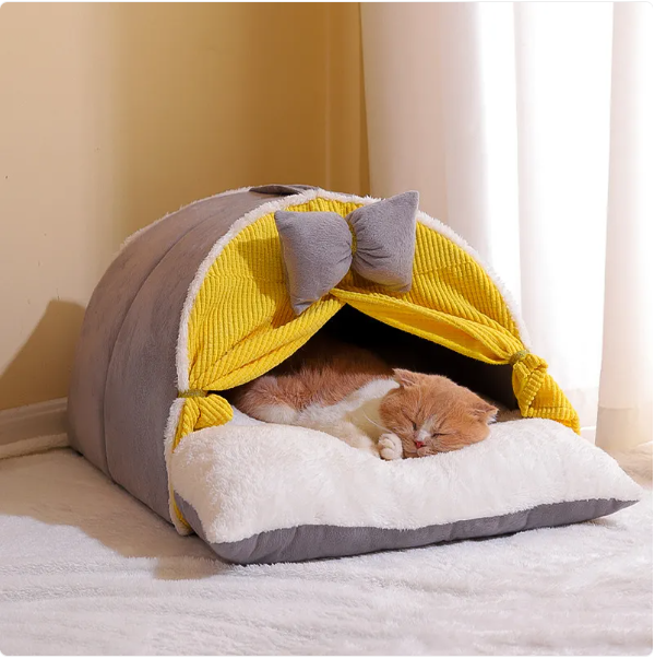 Cozy arch design cat bed with a decorative bow, creating a perfect pet haven and comfortable retreat for indoor cats.