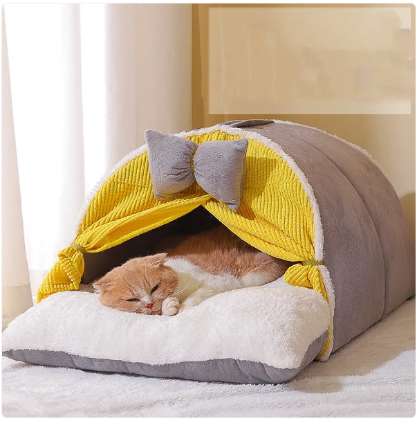 Feline comfort redefined: a stylish arch design cat bed with a delightful bow, perfect for a cozy indoor pet retreat.